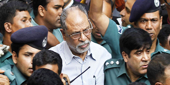 This November 25 photo shows police escorting Abdul Latif Siddique to a Dhaka court around 40 minutes after his surrender at Dhanmondi Police Station.