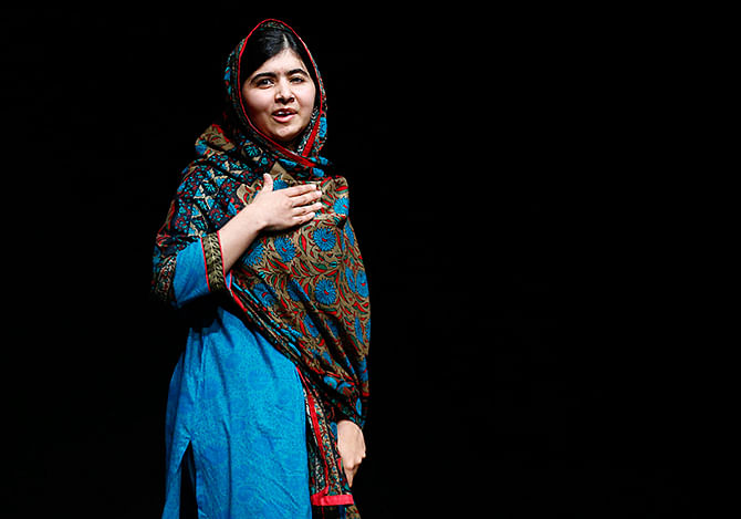 Pakistani schoolgirl Malala Yousafzai, the joint winner of the Nobel Peace Prize, speaks at Birmingham library in Birmingham, central England on October 10, 2014. Photo: Reuters