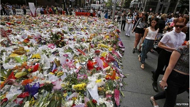 Tributes left to cafe victims in Martin Place, Sydney (17 Dec 2014) Thousands of flowers and other tributes have been left in Martin Place