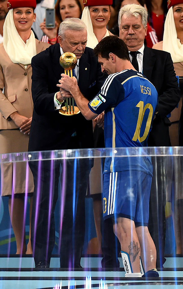 Jose Maria Marin, President of the CBF, presents Lionel Messi of Argentina with the Golden Ball during the award ceremony of the 2014 FIFA World Cup Brazil Final match between Germany and Argentina at Maracana on July 13, 2014 in Rio de Janeiro, Brazil. Photo: Getty Images