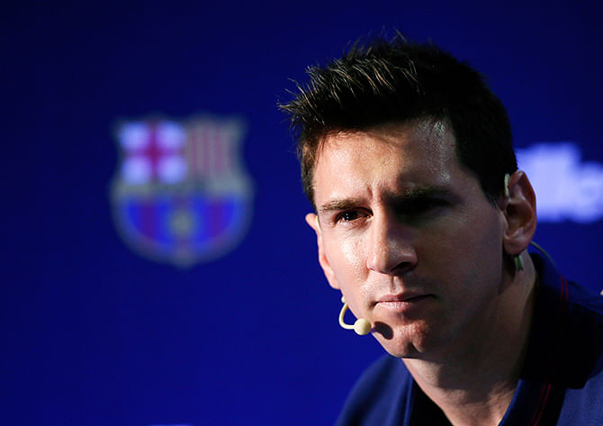 Barcelona's soccer player Lionel Messi of Argentina attends a news conference during a commercial event at Camp Nou stadium in Barcelona October 2, 2014. Photo: Reuters