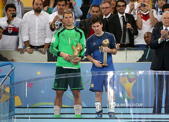 Goalkeeper of Germany Manuel Neuer and Lionel Messi of Argentina are honored as best goalkeeper and best player of the tournament after the 2014 FIFA World Cup Brazil Final match between Germany and Argentina at Estadio Maracana on July 13, 2014 in Rio de Janeiro, Brazil. Photo: Getty Images