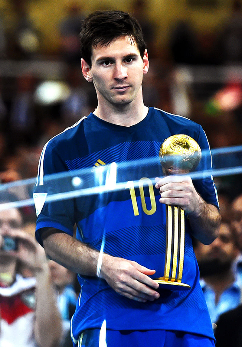 Lionel Messi of Argentina receives the Golden Ball trophy during the award ceremony after the 2014 FIFA World Cup Brazil Final match between Germany and Argentina at Maracana on July 13, 2014 in Rio de Janeiro, Brazil. Photo: Getty Images