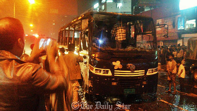 Miscreants torched a bus in Mirpur 2 of the capital on Wednesday evening. Photo: Ridwan Adid Rupon