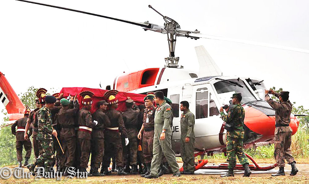 The body of BGB Nayek Mizanur Rahman is being taken to Comilla by a helicopter after his first namaz-e-janaza at Naikkhangchhari battalion-31 headquarters in Bandarban Monday morning. Photo: Anurup Kanti Das