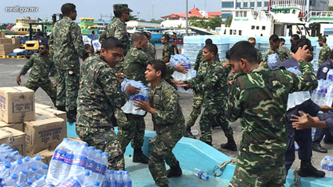 Maldives military distributing water supplies in the crisis hit capital Male. Photo: Minivan News