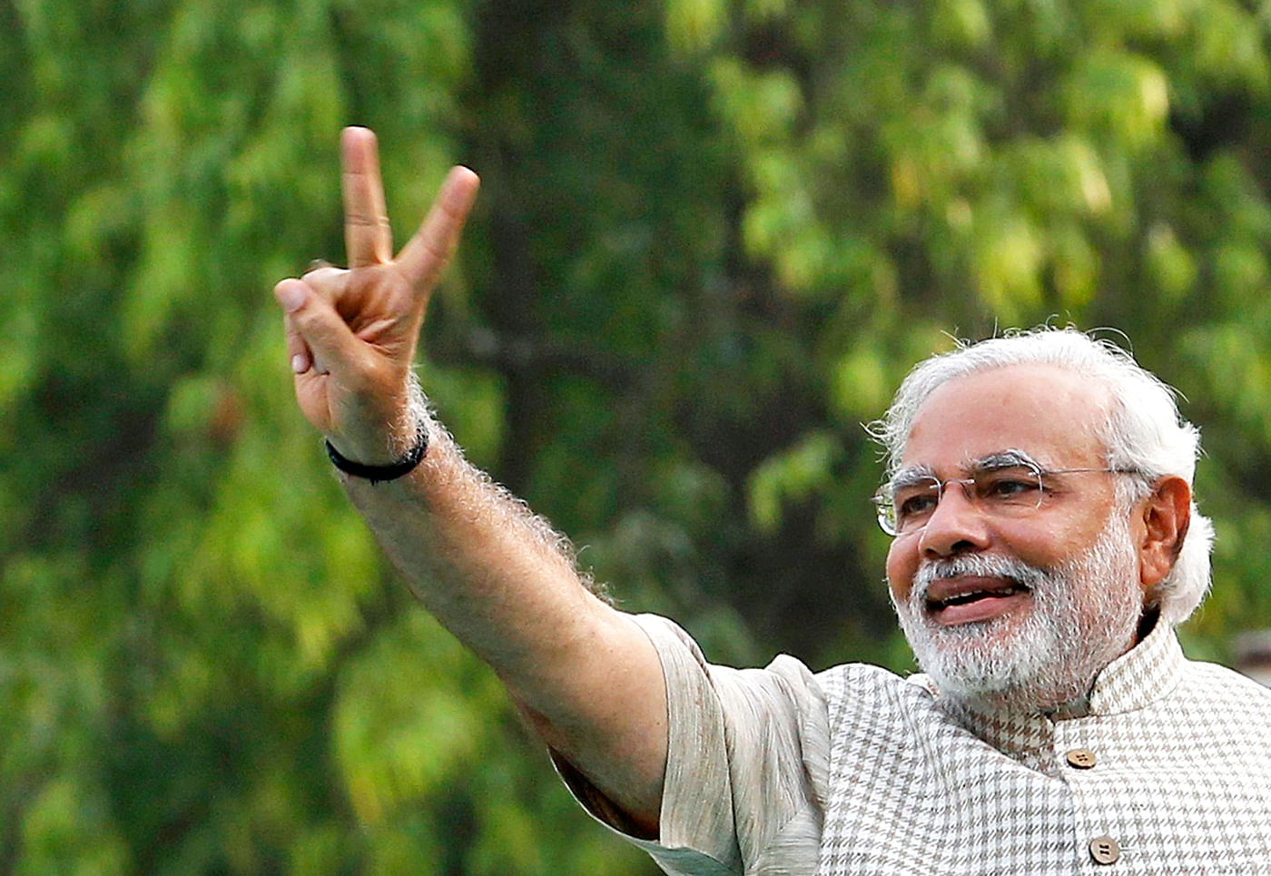 Hindu nationalist Narendra Modi, the prime ministerial candidate for India's main opposition Bharatiya Janata Party (BJP), gestures during a public meeting in Vadodra, in the western Indian state of Gujarat May 16, 2014. Photo: Reuters