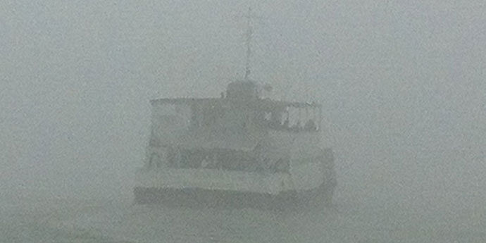 In this December 27 photo, a ferry hardly visible as it sets off from Mawa in Munshiganj.