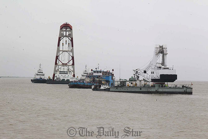 Rescue vessel ‘Nirvik’ joined Rustom in the searching operation at the spot where the launch with around 200 people capsized yesterday. The launch sank amid high winds in the choppy waters where the depth of the river is around 90 feet. Photo: Star