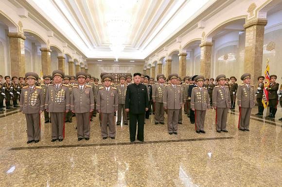 North Korean leader Kim Jong Un visits Kumsusan Palace of the Sun on 72nd birth anniversary of N. Korea's late leader Kim Jong Il. Photo: Reuters