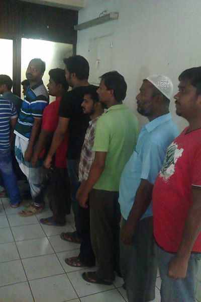 People stand in a queue to give deposition in Narayanganj seven murder at the district's Siddhirganj Power Station Saturday. Photo: Shaheen Mollah