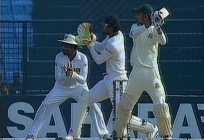 Nasir Hossain hits a boundary on the off-side as he tries to guide Bangladesh to safety following another top order collapse against Sri Lanka on the third day of the Chittagong Test. Photo: TV grab