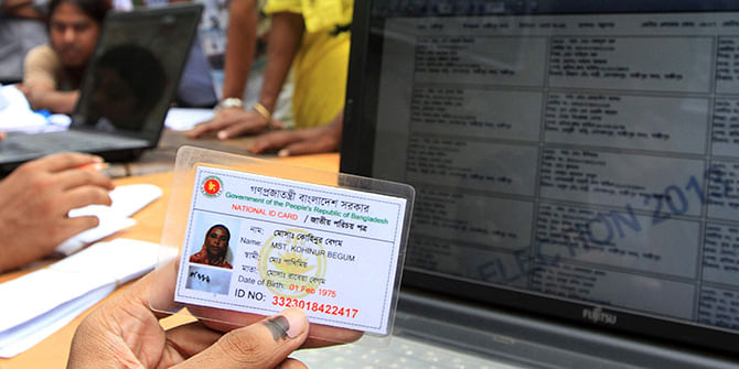 This Star photo taken on July 6, 2013 shows a national identity card is used to collect information on the voter during city corporation polls.