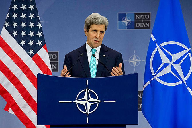 US Secretary of State John Kerry speaks during a news conference at NATO Headquarters in Brussels, April 1, 2014. Photo: Reuters