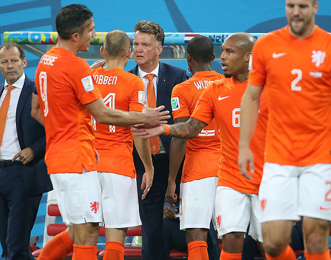 Arjen Robben of the Netherlands talks to head coach of the Netherlands Louis Van Gaal during the 2014 FIFA World Cup Brazil Semi Final match between Netherlands and Argentina at Arena de Sao Paulo on July 9, 2014 in Sao Paulo, Brazil. Photo: Getty Images