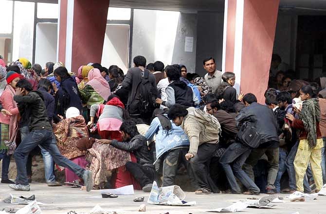 This February 2 photo shows, shocked with fear, Rajshahi University students retreating as police and Bangladesh Chhatra League opened fire on them during a demonstration. Star file