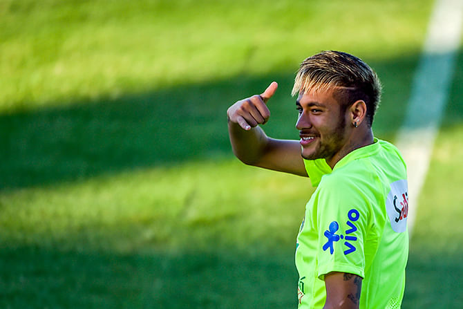 Neymar gestures during a training session at the President Vargas stadium on the eve of the FIFA World Cup 2014 quarter-final match between Brazil and Colombia in Fortaleza on July 3, 2014 in Fortaleza, Brazil. Photo: Getty Images
