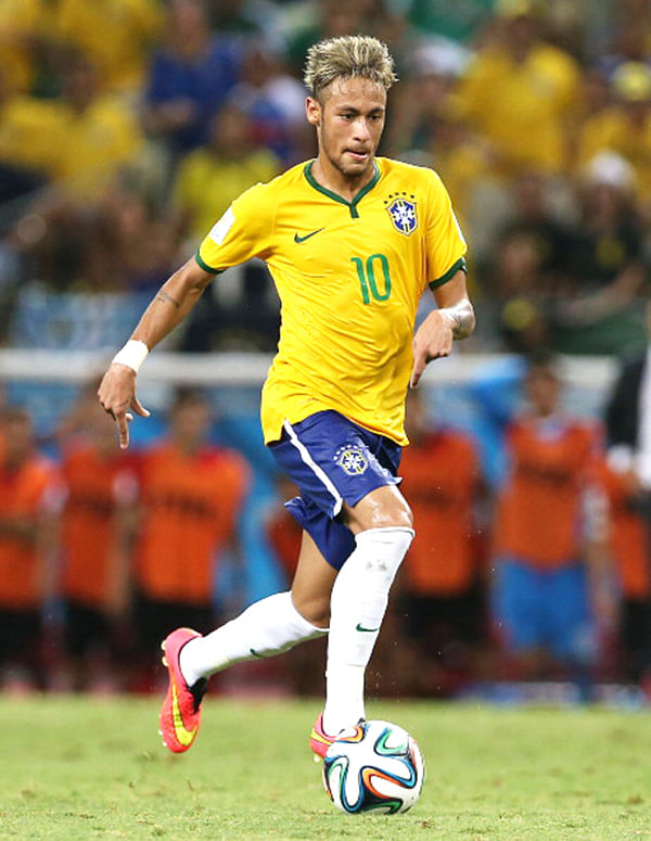  Neymar Jr. of Brazil runs with the ball during the Group A match of the 2014 World Cup between Brazil and Mexico at the Estadio Castelao on June 17, 2014 in Fortaleza, Brazil. Photo: Getty Images