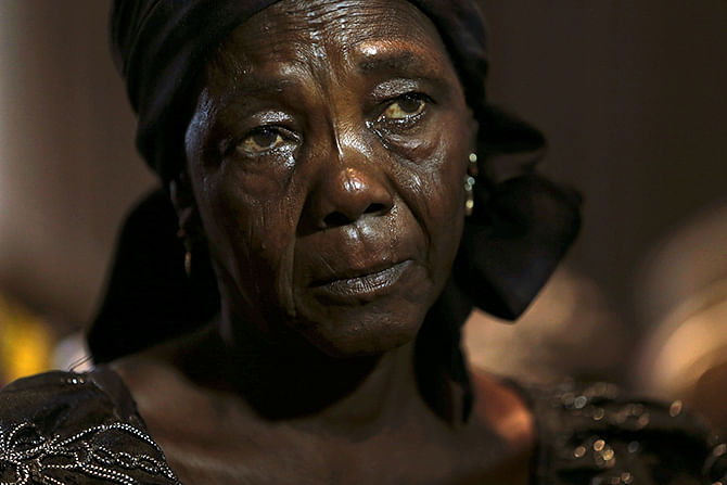 Hauwa Nkaki, mother of one of more than 200 girls abducted by Boko Haram militants in the remote village of Chibok, cries as she reacts during a news conference on the girls in Lagos of Nigeria on Thursday. Photo: Reuters