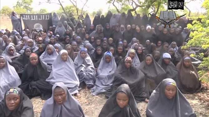 Kidnapped schoolgirls are seen at an unknown location in this still image taken from an undated video released by Nigerian Islamist rebel group Boko Haram. The leader of the Nigerian Islamist rebel group Boko Haram has offered to release more than 200 schoolgirls abducted by his fighters last month in exchange for prisoners, according to a video seen on YouTube. Photo: Reuters/Boko Haram handout via Reuters TV 