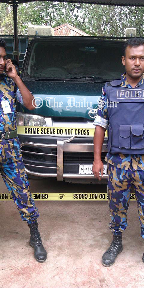 Law enforcers seize a microbus at the house of a local Awami Legaue leader Nur Hossain at his Tekpara residence in Siddhirganj, Narayanganj on Saturday. Photo: Shaheen Mollah