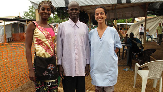 Nurse Monia Sayah (R) standing with a recovered patient and the nurse supervisor at the Doctors Without Borders facility in Guinea where she treated Ebola patients. Photo taken from CBS News