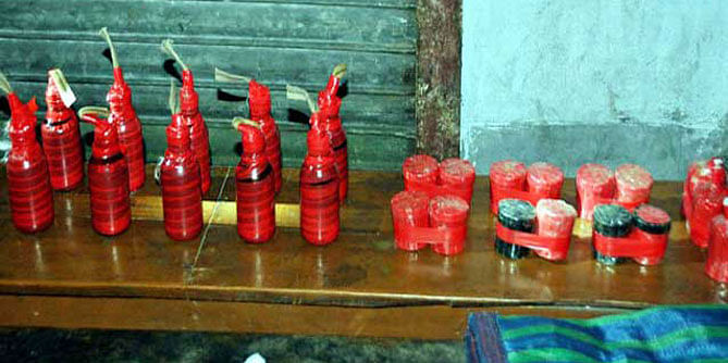 In this December 19, 2013 file photo- 25 crude bombs are seen which Rab officials found in abandoned condition in Chatmohar upazila of Pabna.