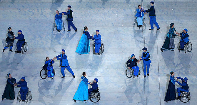 Performers take part in the opening ceremony of the 2014 Paralympic Winter Games in Sochi March 7, 2014. Photo: Reuters