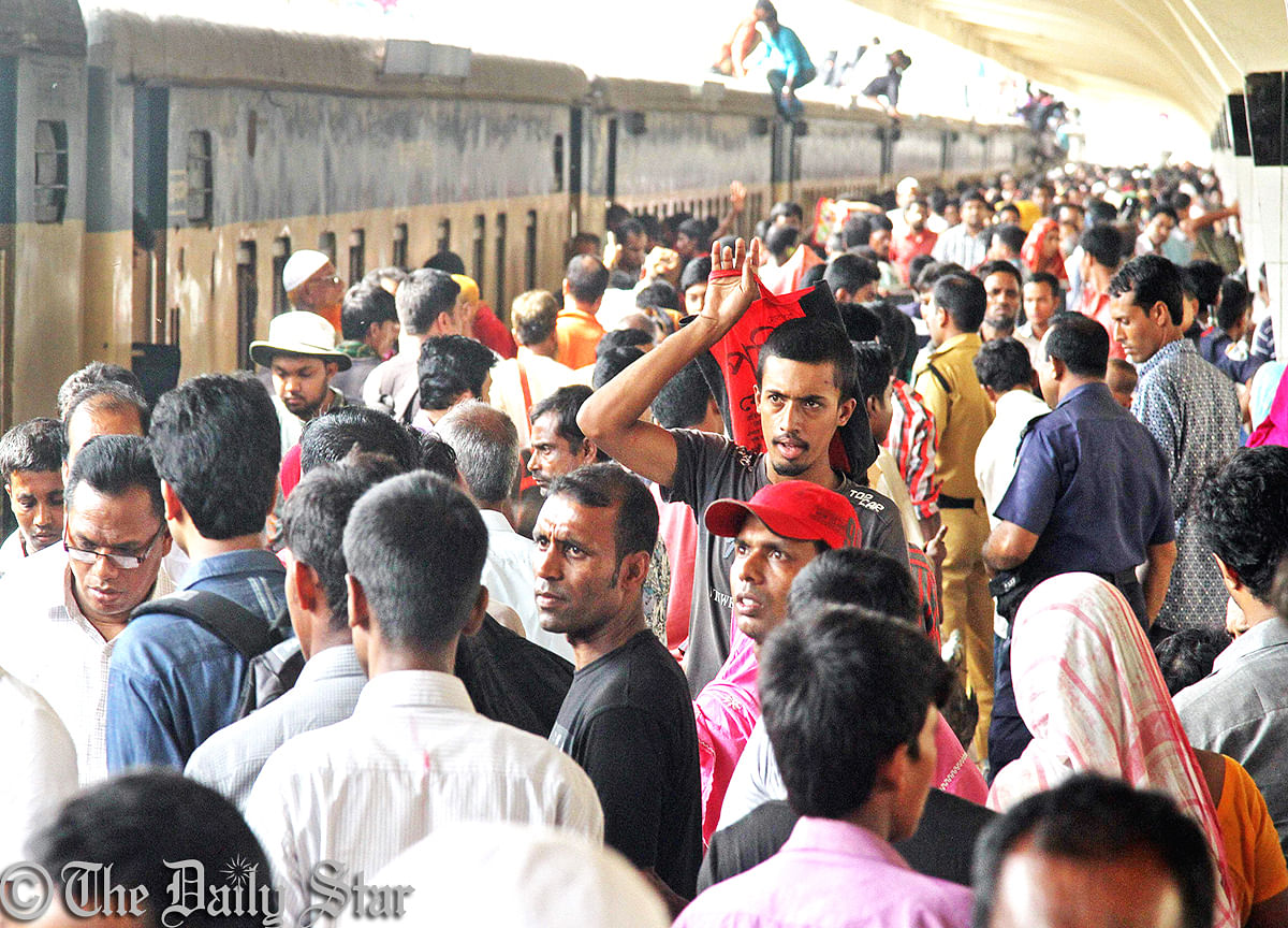 Kamalapur railway station sees unusual crowd of passengers Tuesday after road transport owners and workers start strike in Rajshahi division and eight districts of Dhaka division. The strike called off this evening following the government's assurance to fulfill their demands. Photo: Amran Hossain