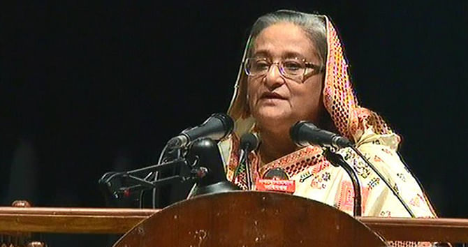 Prime Minister Sheikh Hasina addresses the National Primary Education Week 2015 programme at Osmani Memorial Auditorium in capital. Photo: TV grab