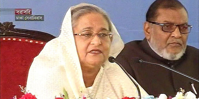 Prime Minister Sheik Hasina addresses a programme observing Armed Forces Day  at Dhaka Cantonment on Friday. Photo: TV grab