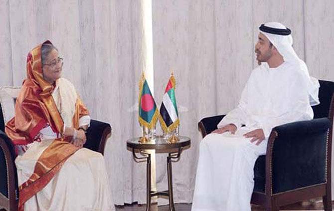 Prime Minister Sheikh Hasina talks to Sheikh Abdullah Bin Zayed Al Nahyan, foreign minister of the UAE, at St Regis hotel in Abu Dhabi Sunday. Photo: PID