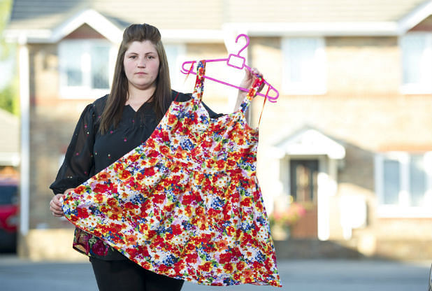Rebecca Gallagher with the dress she bought from Primark in Swansea. Photo taken from South Walse Evening Post