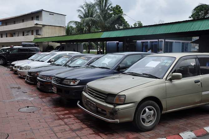  Seven private cars seized by Rapid Action Battalion from carjackers possession are kept at its headquarters in the capital Saturday. Photo: Courtesy