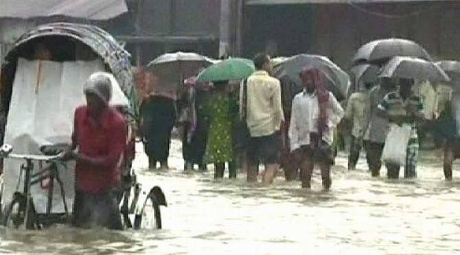 Incessant rainfall causes sufferings to the people of Chittagong city for the fourth consecutive days Monday. Photo: TV grab 