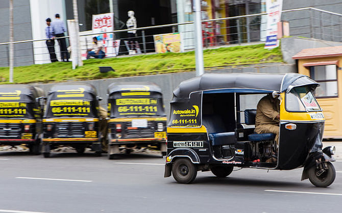 A handful of start-ups in India have begun to use technology to more easily connect auto-rickshaw drivers with customers — a twist to Uber and Lyft, the taxi-hailing apps. Photo: The New York Times