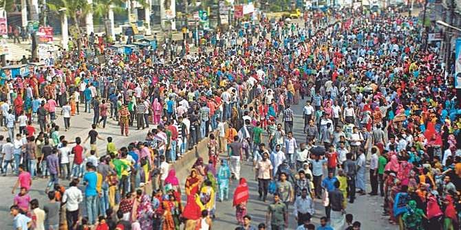 This September 23 photo shows garment workers, demanding a minimum monthly salary of around Tk 8,000, demonstrate at Tongi in Gazipur. 