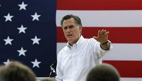 In this July 2, 2014, file photo, Mitt Romney, the former Republican presidential nominee, addresses a crowd of supporters while introducing New Hampshire Senate candidate Scott Brown at a farm in Stratham, NH Romney told a small group of Republican donors that he's eying a third run at the White House. Photo: AP