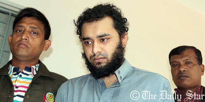 Detectives bring Samiun Rahman alias Ibn Hamdan before media at their headquarters after arresting him from Kamalapur in Dhaka. Saimun, a Bangladesh origin British citizen, who fought against Assad government in Syria six months after he came here to recruit jihadists for Syrian militant groups, detectives say. Photo: Palash Khan