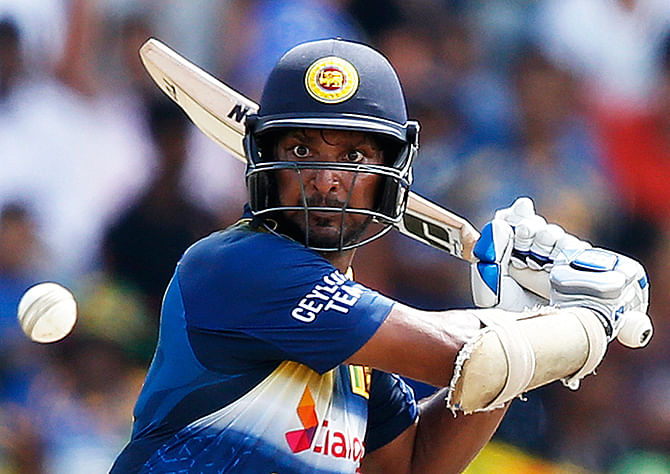 Sri Lanka's Kumar Sangakkara plays a shot during their sixth ODI (One Day International) cricket match against England in Pallekele, December 13, 2014. Photo: Reuters