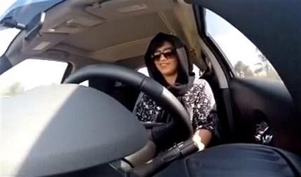 This November 30, 2014 image made from video released by Loujain al-Hathloul, shows her driving towards the United Arab Emirates - Saudi Arabia border before her arrest on December 1, 2014.  Photo: AP