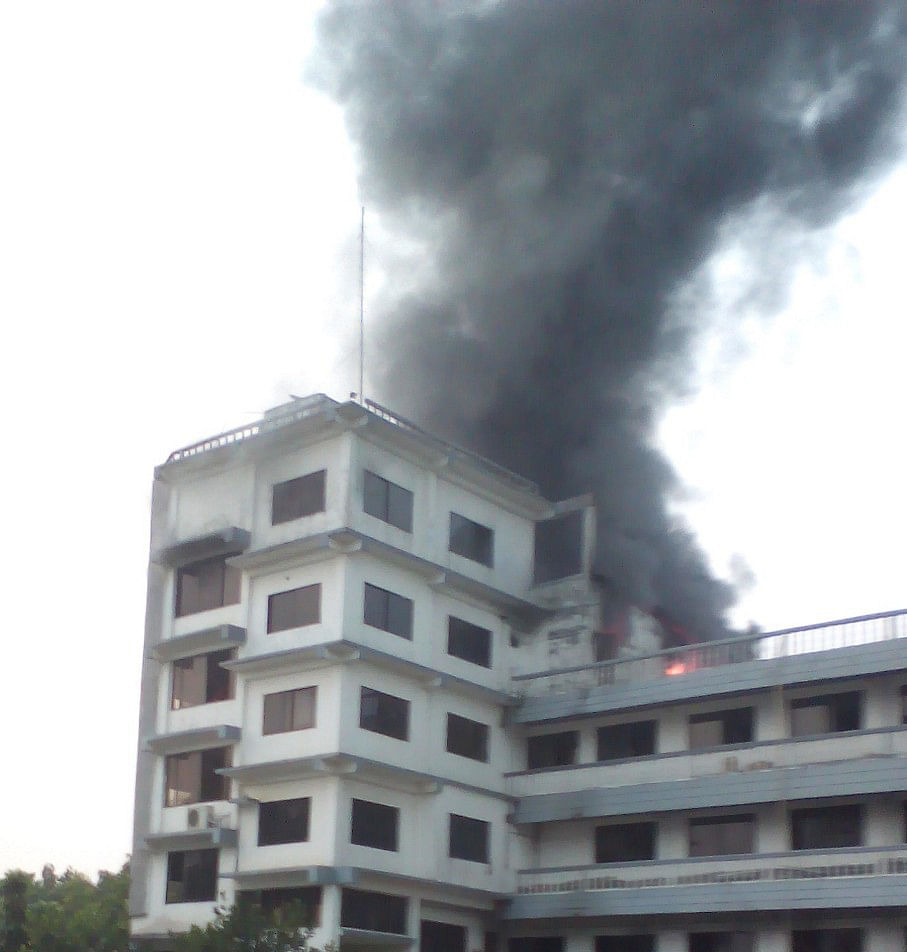 Smoke coming out from Fuji Garment building after the fire this afternoon. Photo: Star