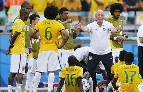 Brazil's coach Luiz Felipe Scolari walks through the coaching zone during the World Cup round of 16 soccer match between Brazil and Chile at the Mineirao Stadium in Belo Horizonte, Brazil, on June 28. Photo: AP 