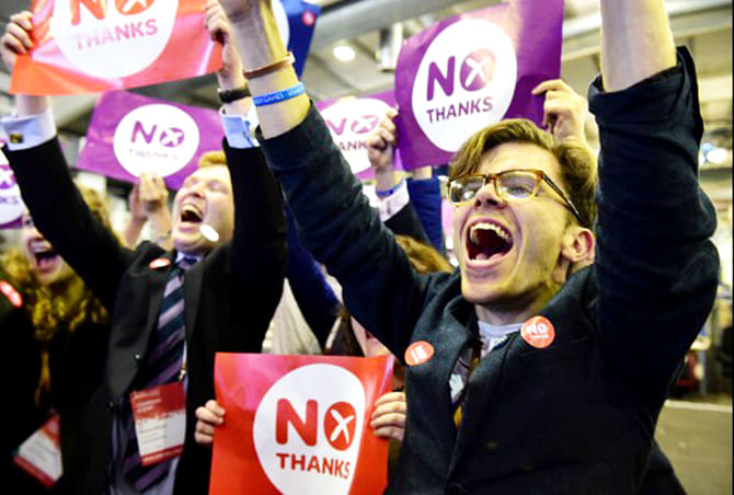 People opposed to Scottish independence celebrate the final results of a historic referendum Friday, September 19, in Edinburgh, Scotland. This photo is taken from CNN website