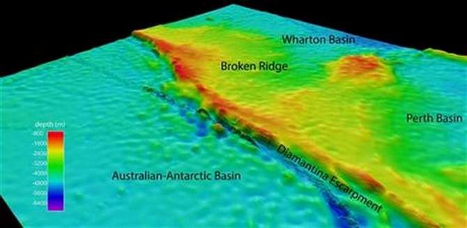 This undated graphic provided by Commonwealth of Australia (Geoscience Australia) Dr Robin Beaman, James Cook University, shows the North-westerly view of the search area for the missing Malaysian Airlines Flight 370 at Broken Ridge, south-eastern Indian Ocean, which shows the Diamantina Escarpment dropping from about 800 meters to over 5000 meters in depth. Photo: AP