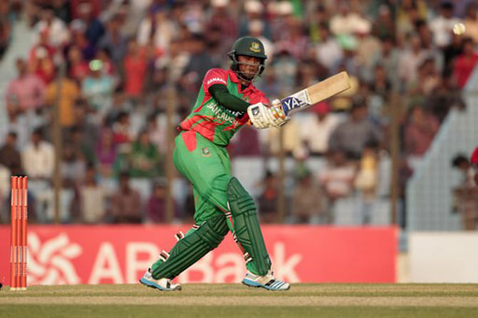 Bangladesh cricketer Shakib Al Hasan plays a shot during the first one day international (ODI) match between Bangladesh and Zimbabwe at The Zahur Ahmed Chowdhury Stadium in Chittagong on November 21, 2014. Photo: AFP