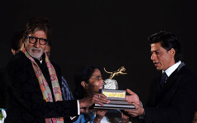 Big B, Shah Rukh Khan and Mamata Banerjee at the gala opening of the 20th Kolkata International Film Festival. Photo: NDTV
