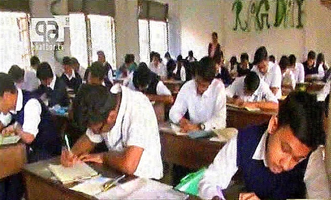 Student's sit for their SSC examinations on the first day on Friday at a center in Azimpur Girls High School in Dhaka. Photo: TV grab
