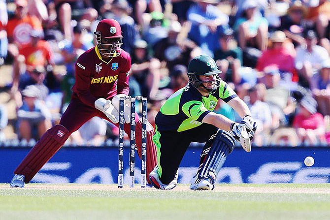 Ireland batsman Paul Stirling sweeping a delivery in a significant innings of 92 runs against the West Indies making the 304 run chase feasible for the Irish fans on February 14, 2015. Photo: ICC