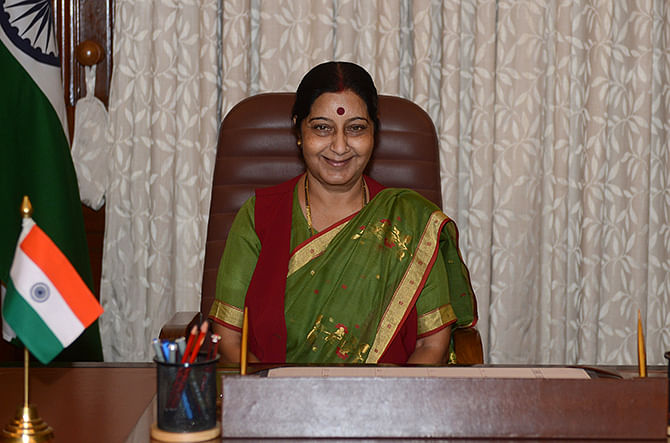 India's newly appointed Minister of External Affairs Sushma Swaraj poses after arriving for her first day at office in New Delhi on May 28, 2014. New Indian Prime Minister Narendra Modi announced his cabinet May 27, combining several portfolios to cut the number of government positions and giving many regional politicians their first national experience. Photo: AFP/Getty Images